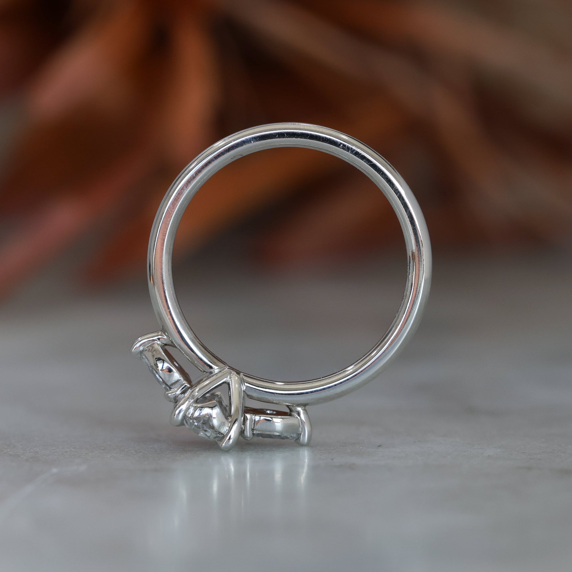 0.72ct Oval Cut Trilogy Platinum engagement ring