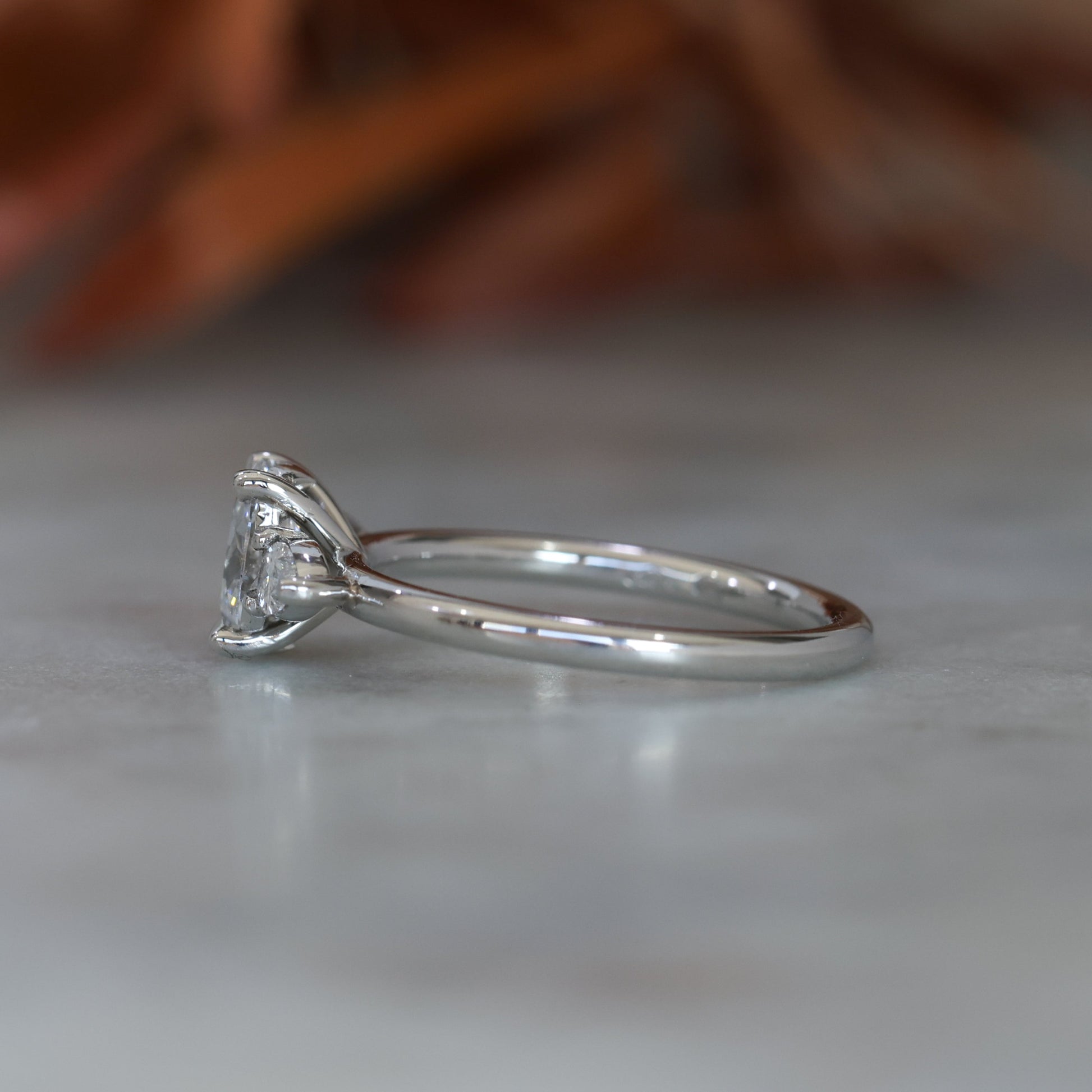 0.72ct Oval Cut Trilogy Platinum engagement ring