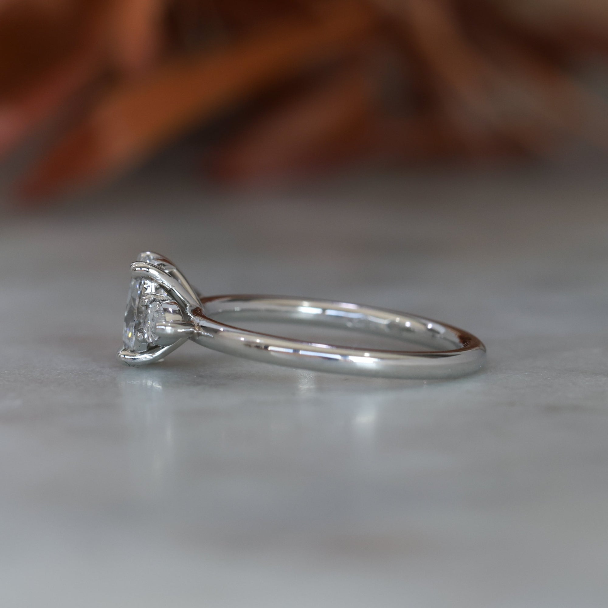 0.72ct Oval Cut Trilogy Platinum engagement ring