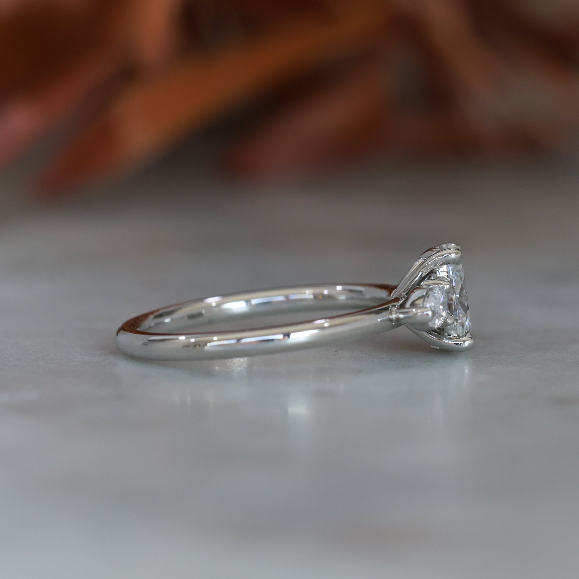 0.72ct Oval Cut Trilogy Platinum engagement ring