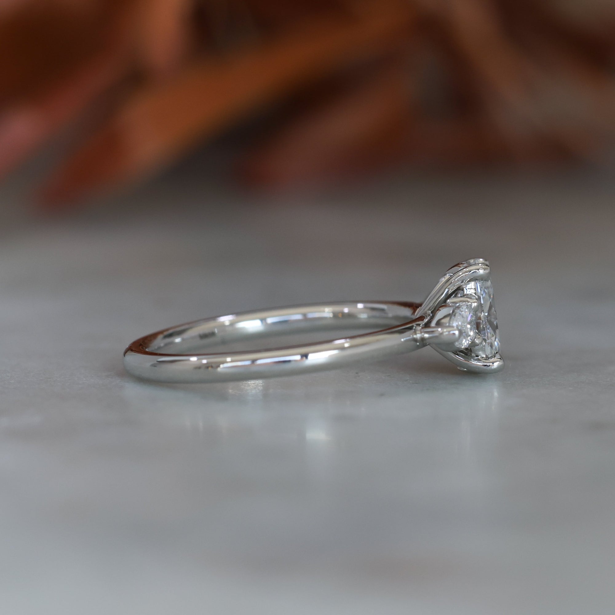 0.72ct Oval Cut Trilogy Platinum engagement ring