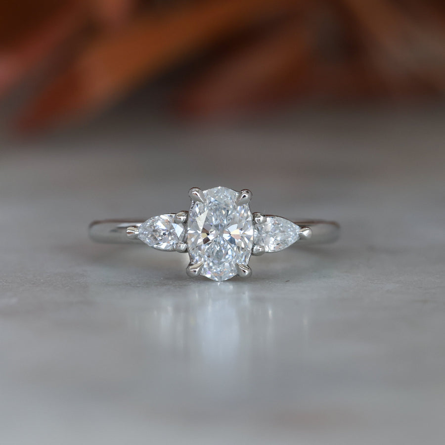 0.72ct Oval Cut Trilogy Platinum engagement ring