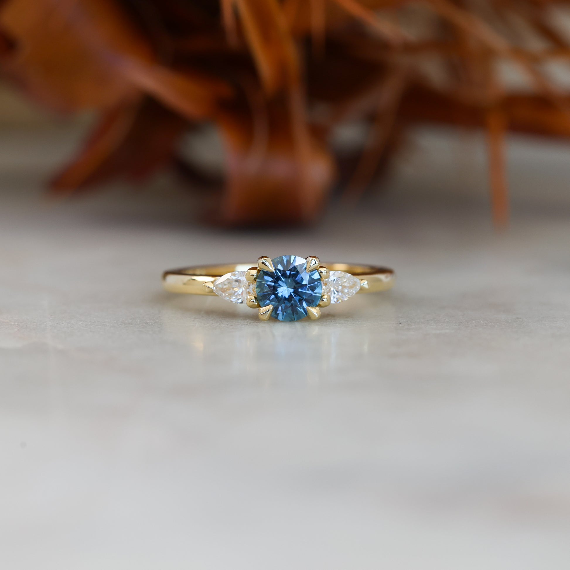 MAY TRILOGY | 0.72CT ROUND CUT MONTANA SAPPHIRE ENGAGEMENT RING I