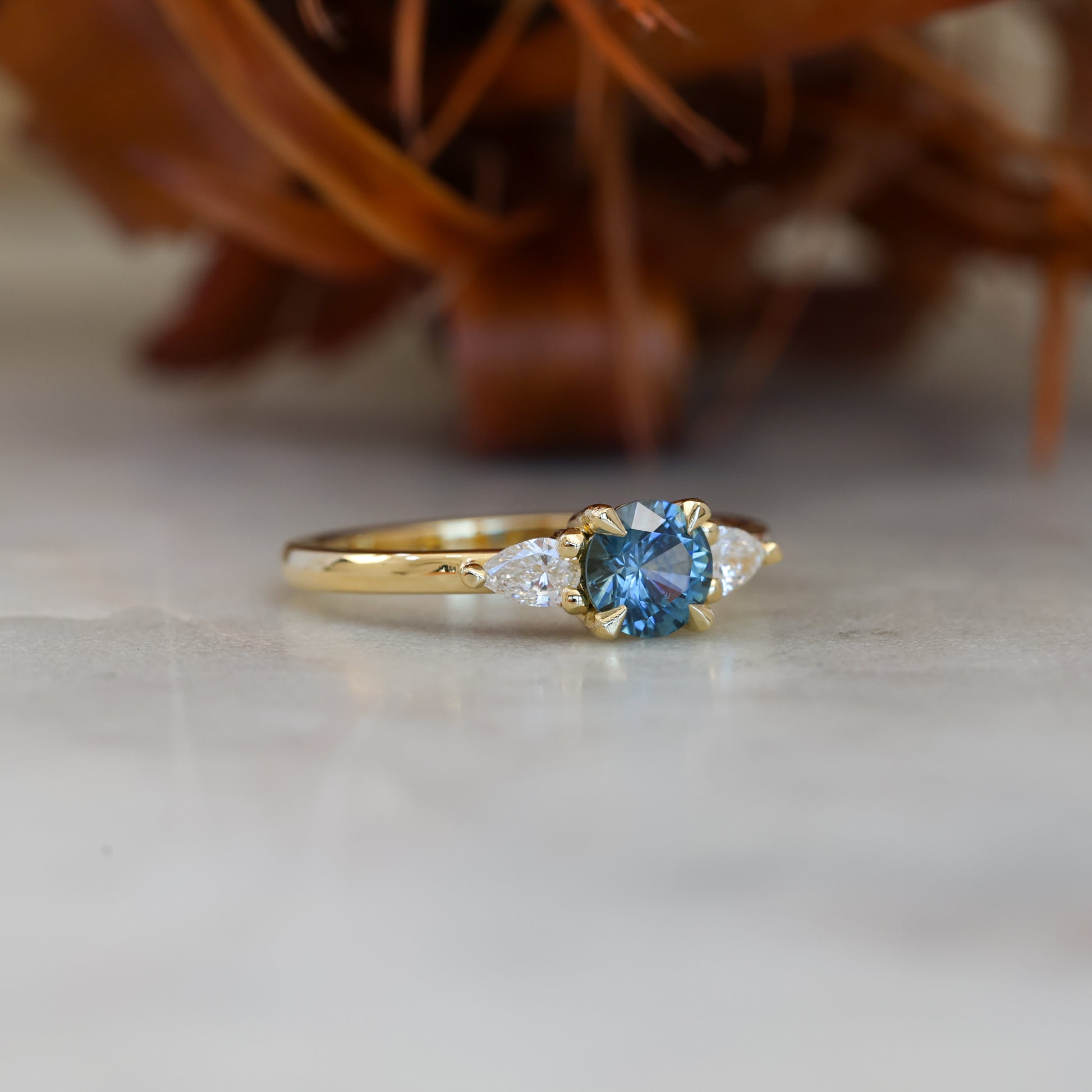 MAY TRILOGY | 0.72CT ROUND CUT MONTANA SAPPHIRE ENGAGEMENT RING I