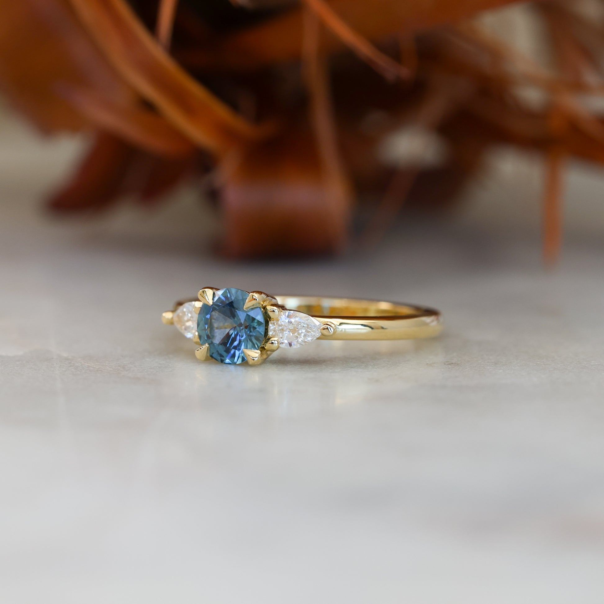 MAY TRILOGY | 0.72CT ROUND CUT MONTANA SAPPHIRE ENGAGEMENT RING I