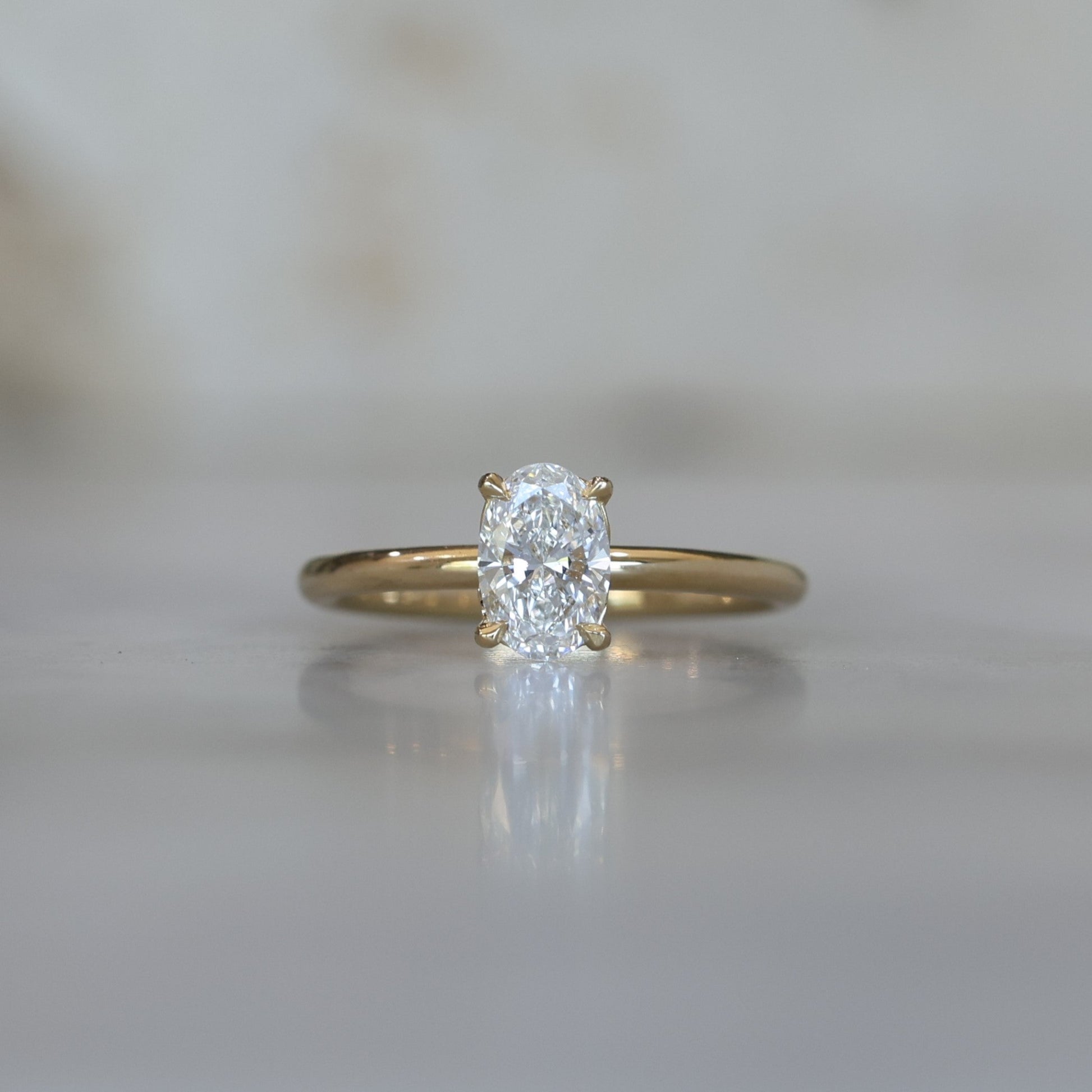0.76ct Oval Cut Diamond Solitaire engagement ring