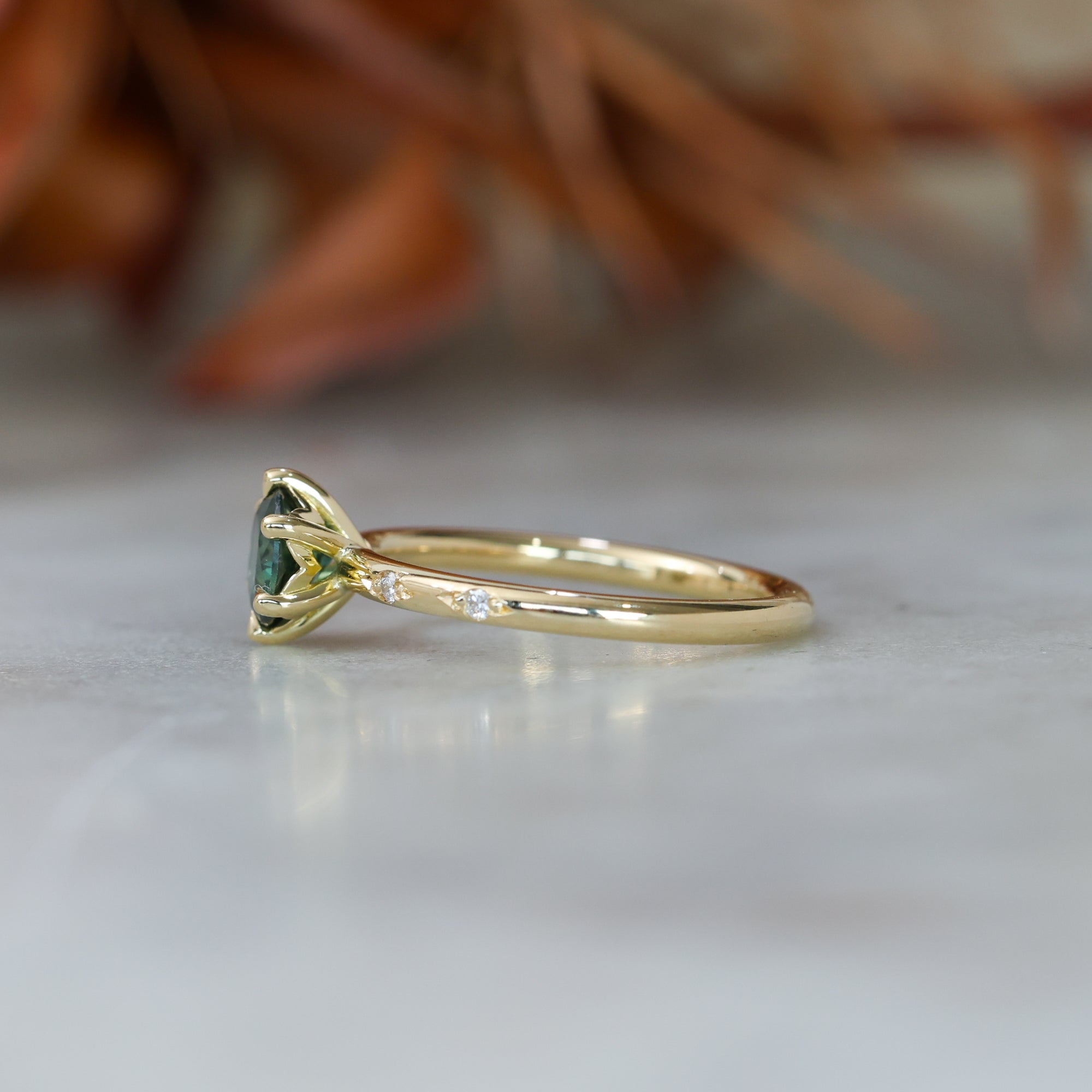 0.80ct Australian Parti Sapphire engagement ring with diamond band