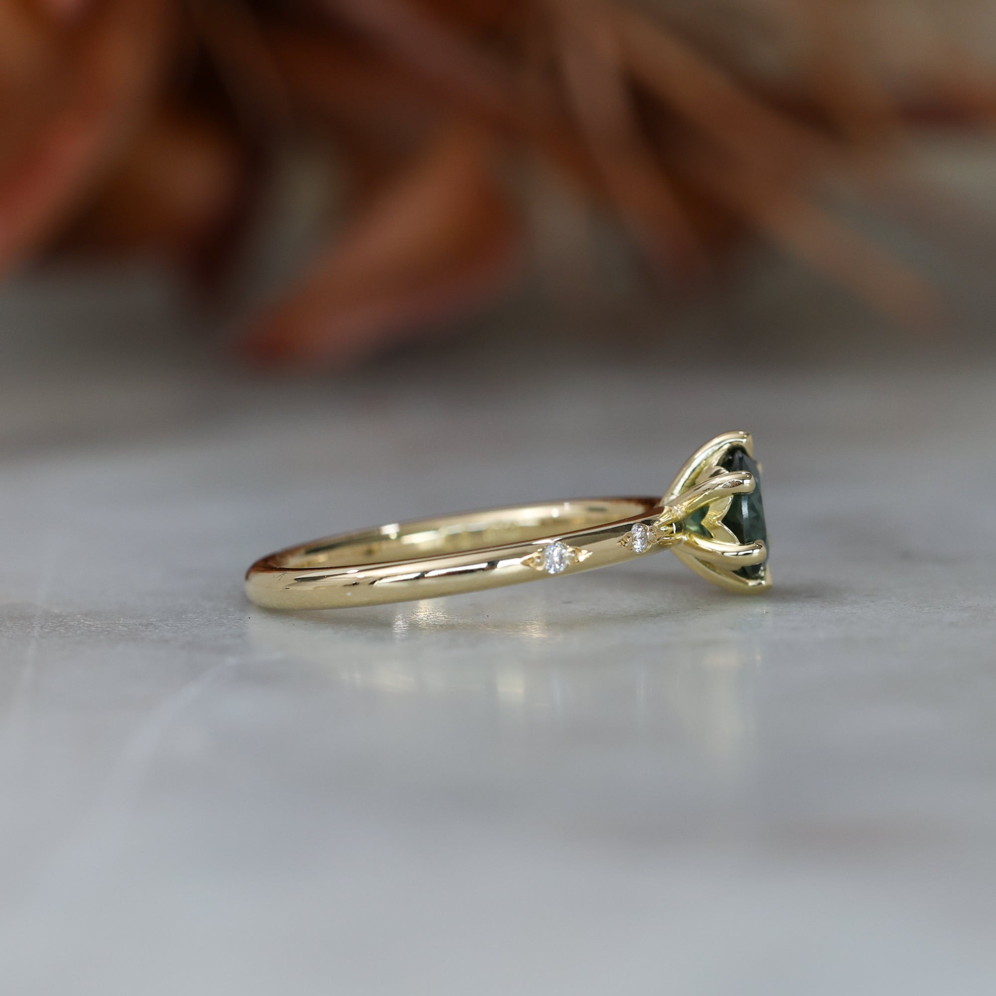 0.80ct Australian Parti Sapphire engagement ring with diamond band