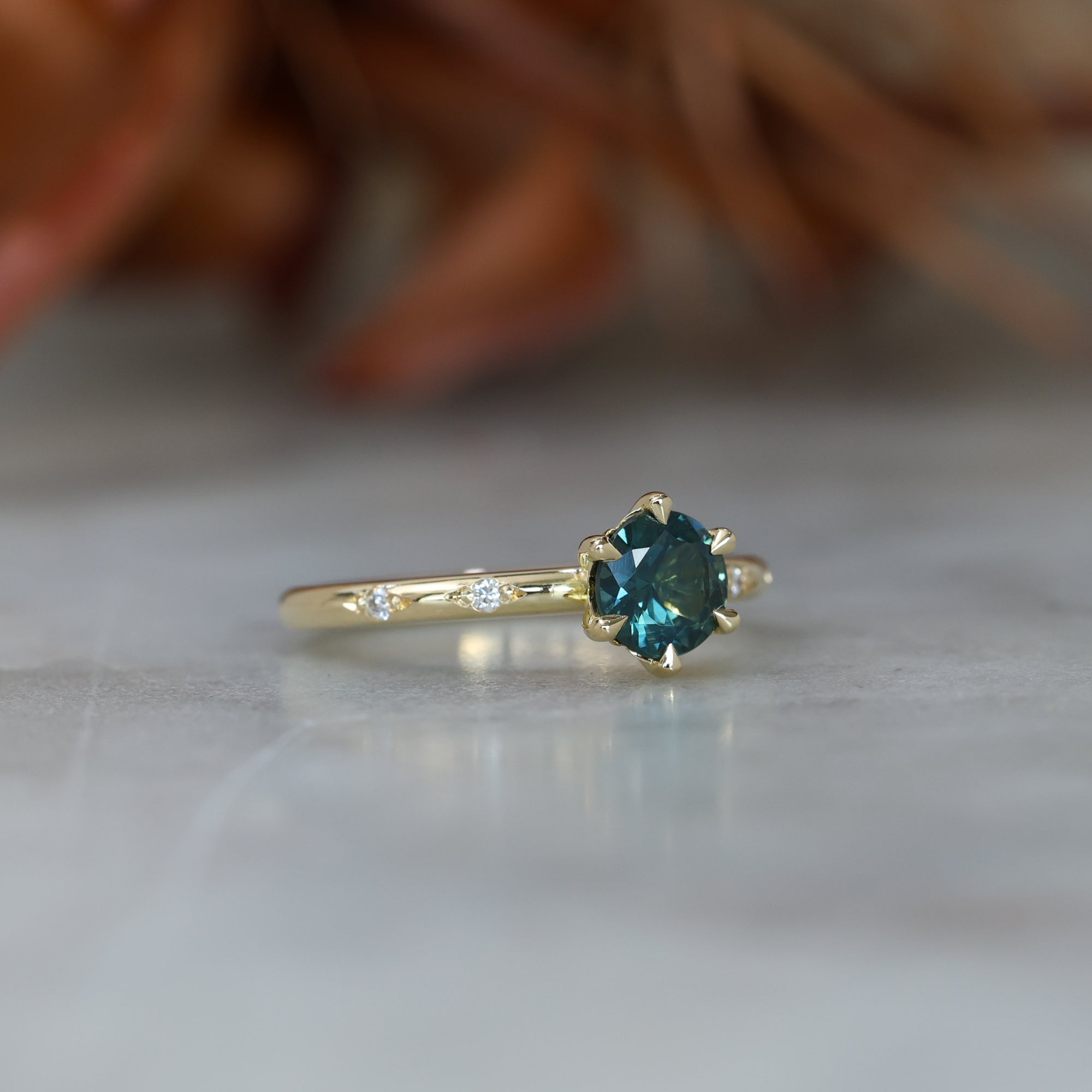 0.80ct Australian Parti Sapphire engagement ring with diamond band