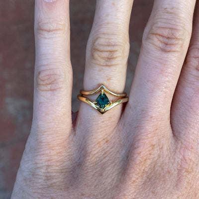 0.80ct Kite cut australian parti sapphire engagement ring on hand with wedding band