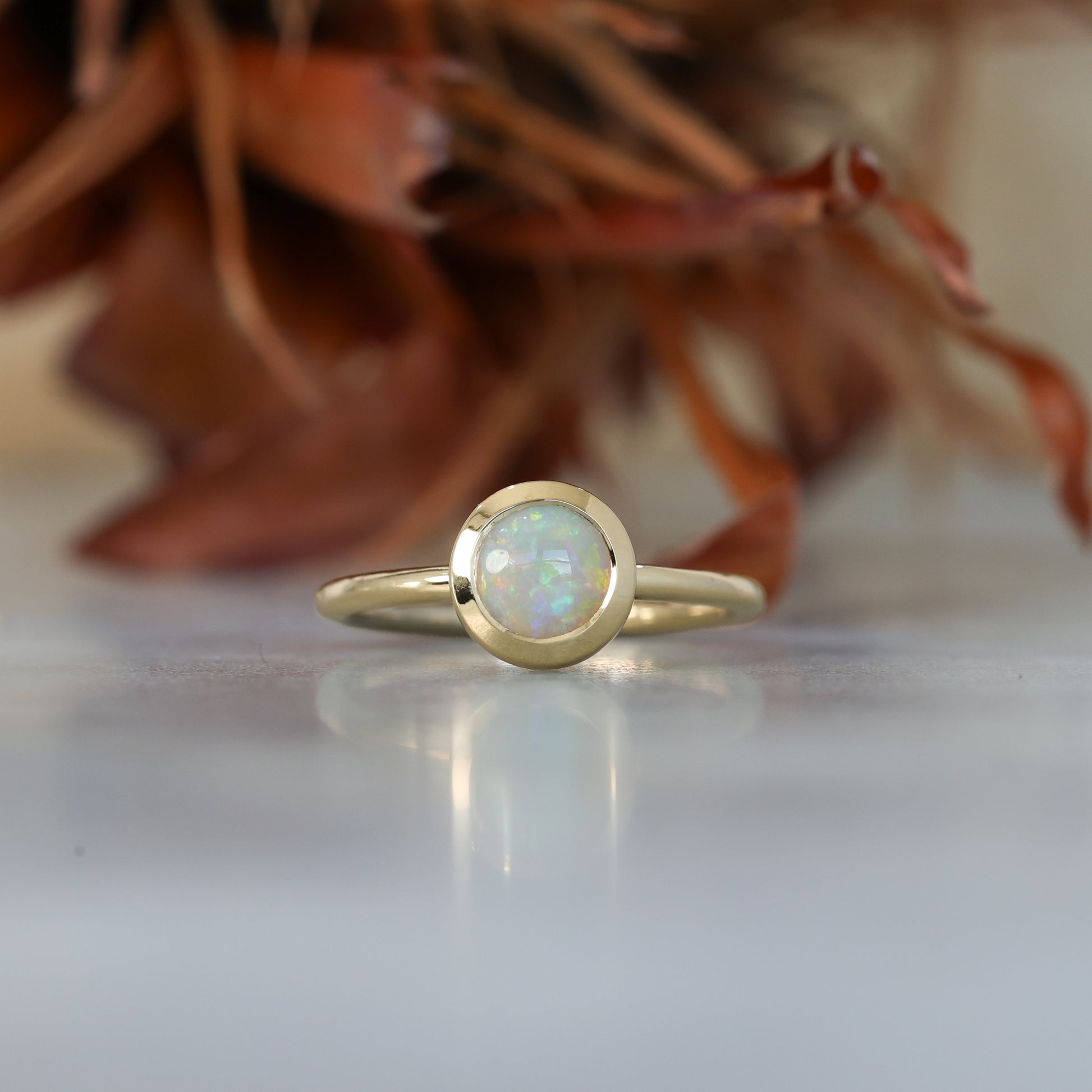0.80ct ROUND OPAL | BEZEL SET RING