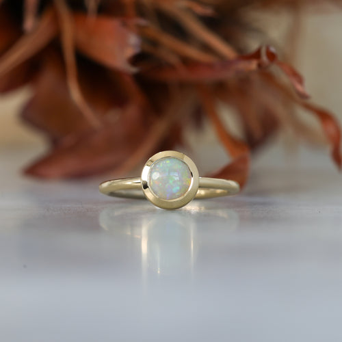 0.80ct ROUND OPAL | BEZEL SET RING