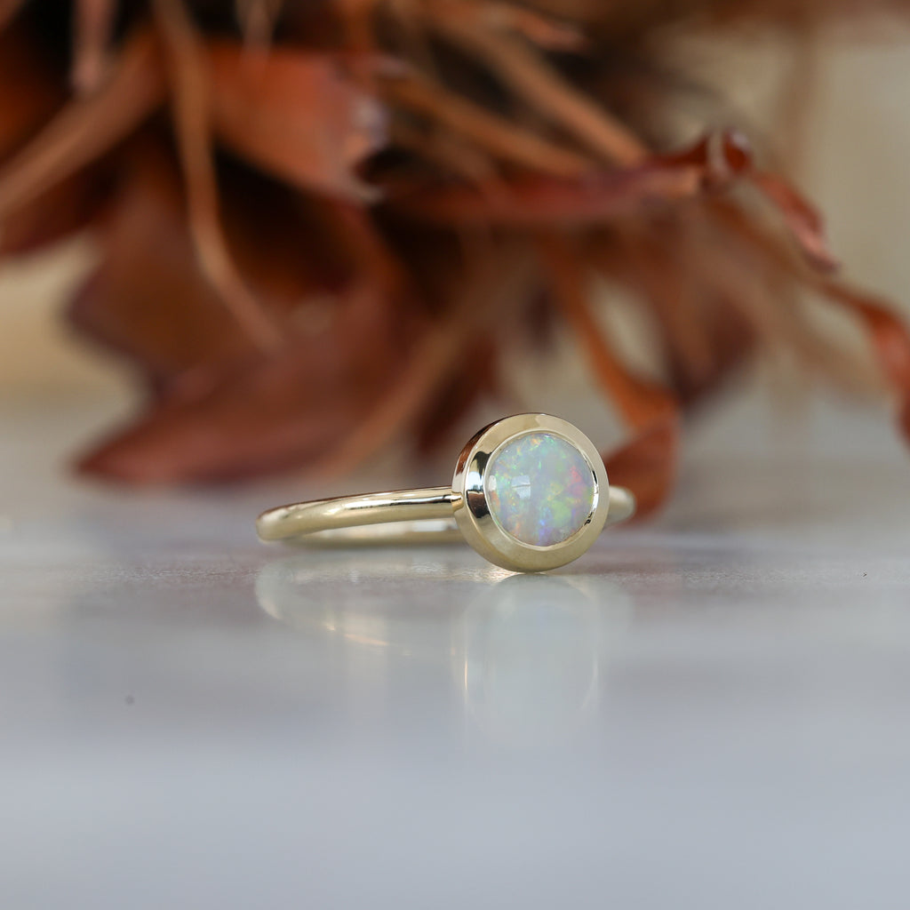 0.80ct ROUND OPAL | BEZEL SET RING