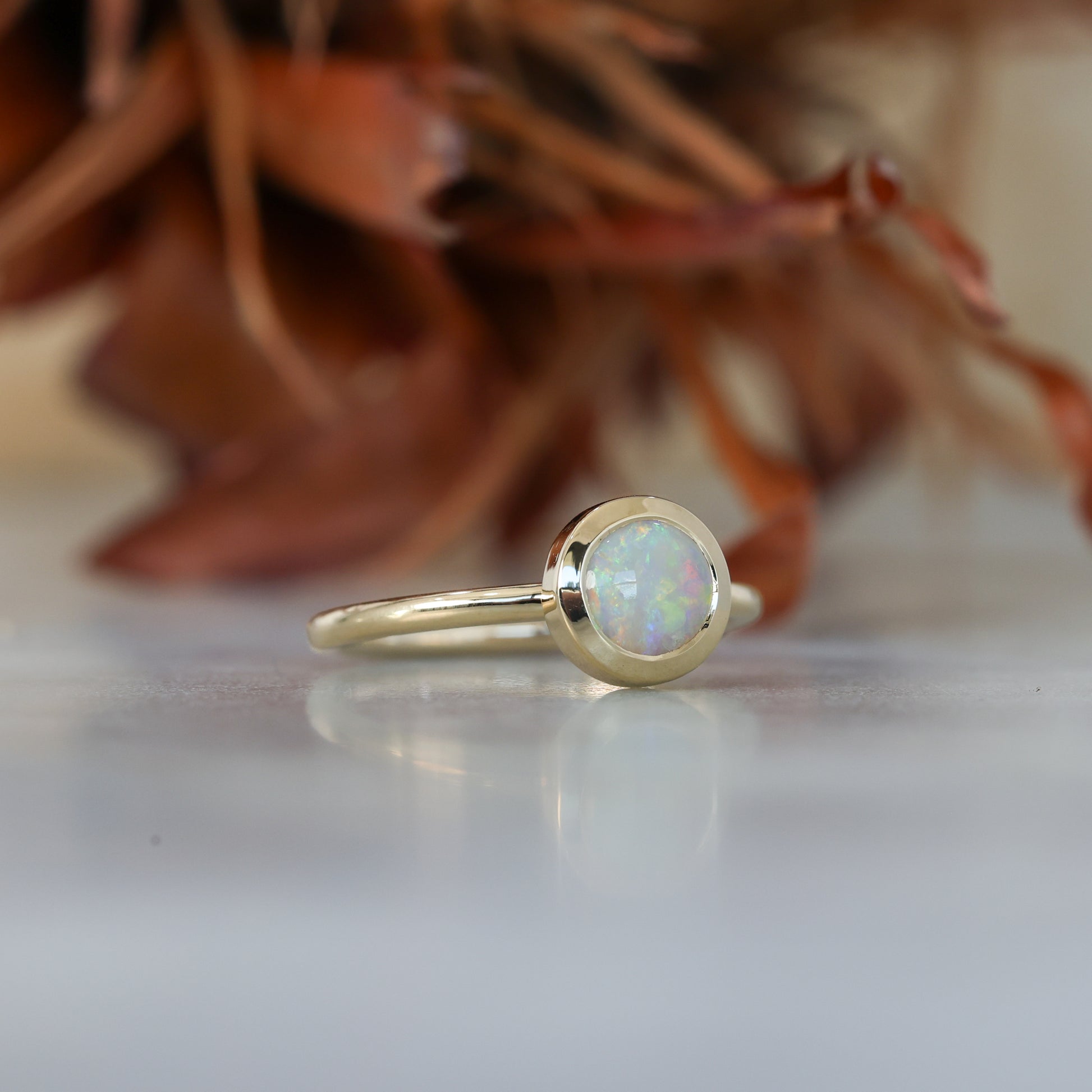 0.80ct ROUND OPAL | BEZEL SET RING