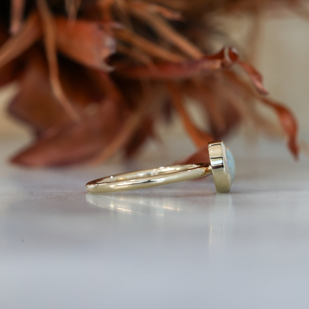 0.80ct ROUND OPAL | BEZEL SET RING