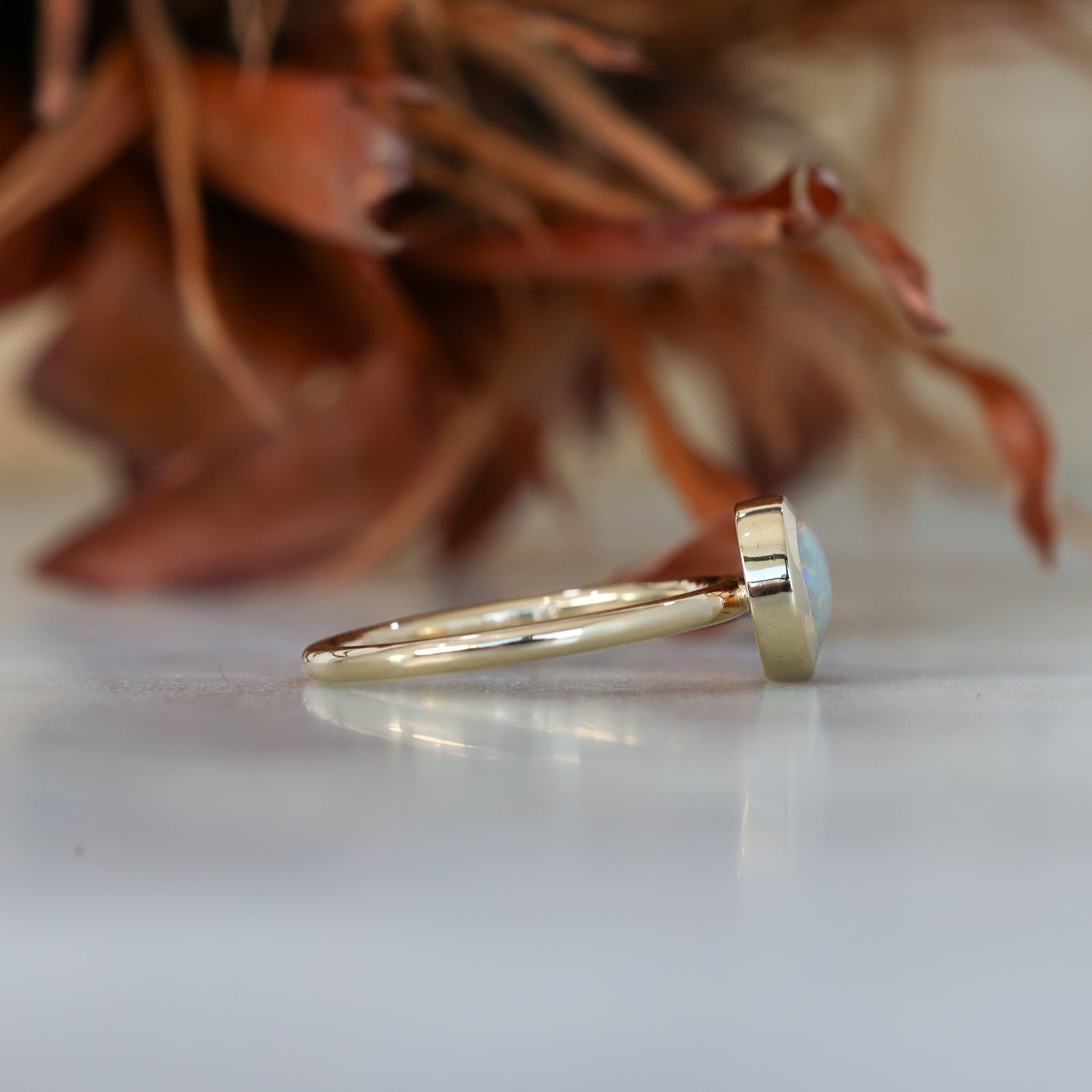 0.80ct ROUND OPAL | BEZEL SET RING