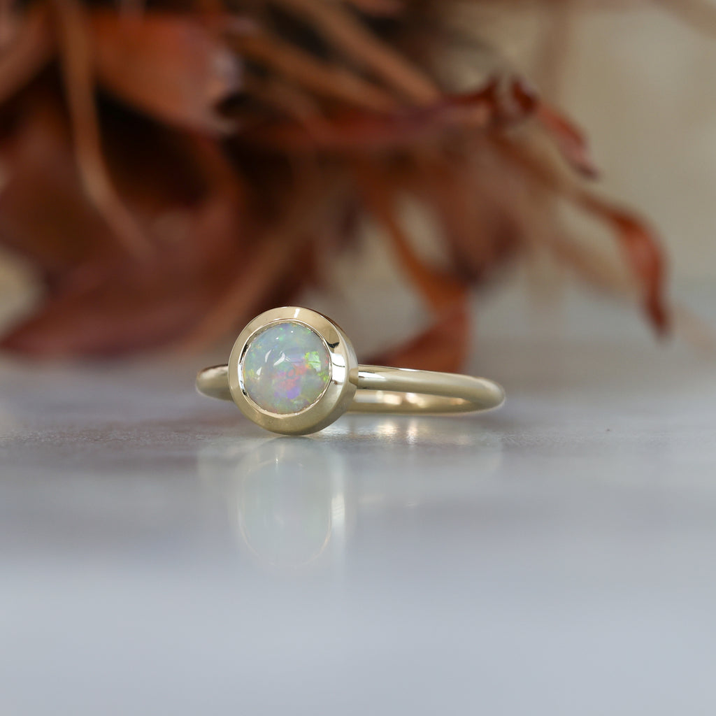 0.80ct ROUND OPAL | BEZEL SET RING