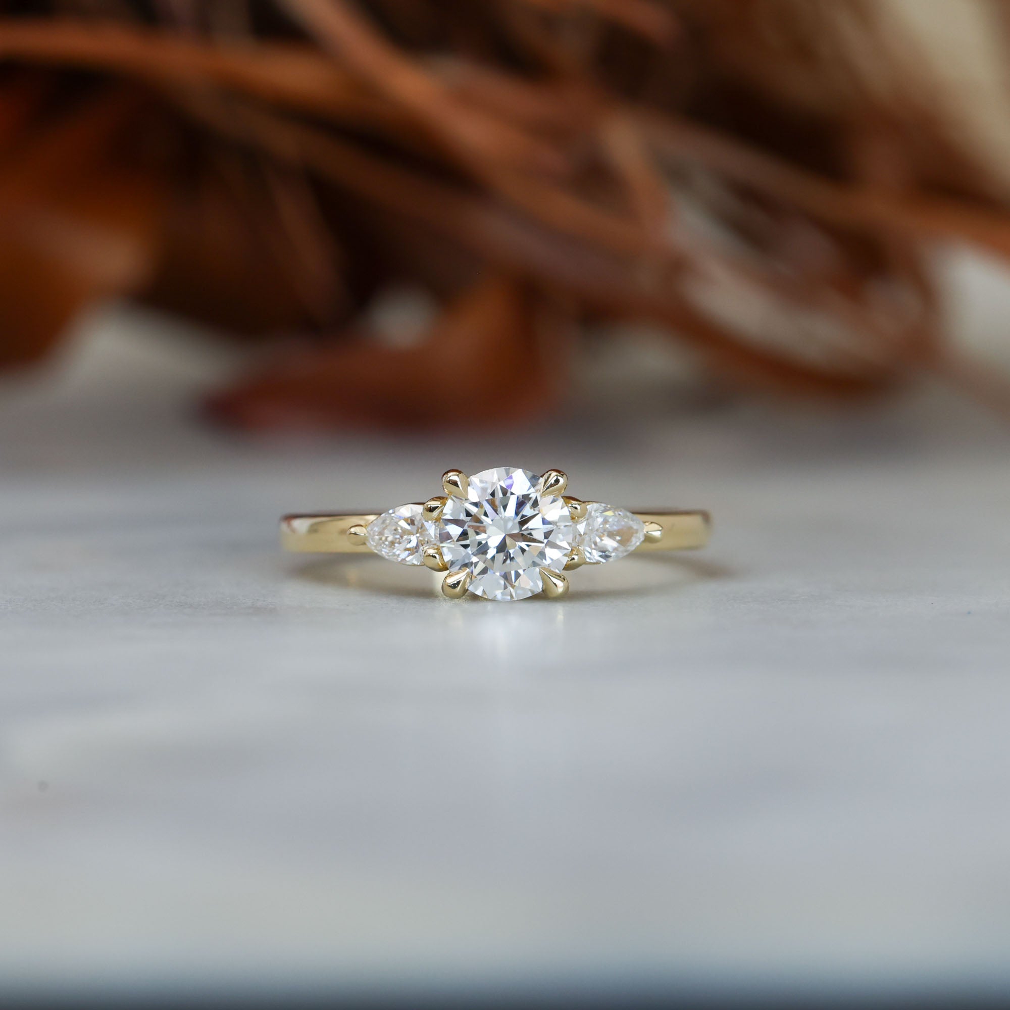 0.80ct round cut diamond trilogy engagement ring