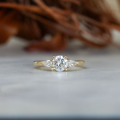 0.80ct round cut diamond trilogy engagement ring