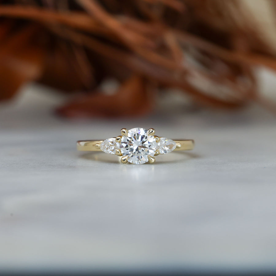 0.80ct round cut diamond trilogy engagement ring 