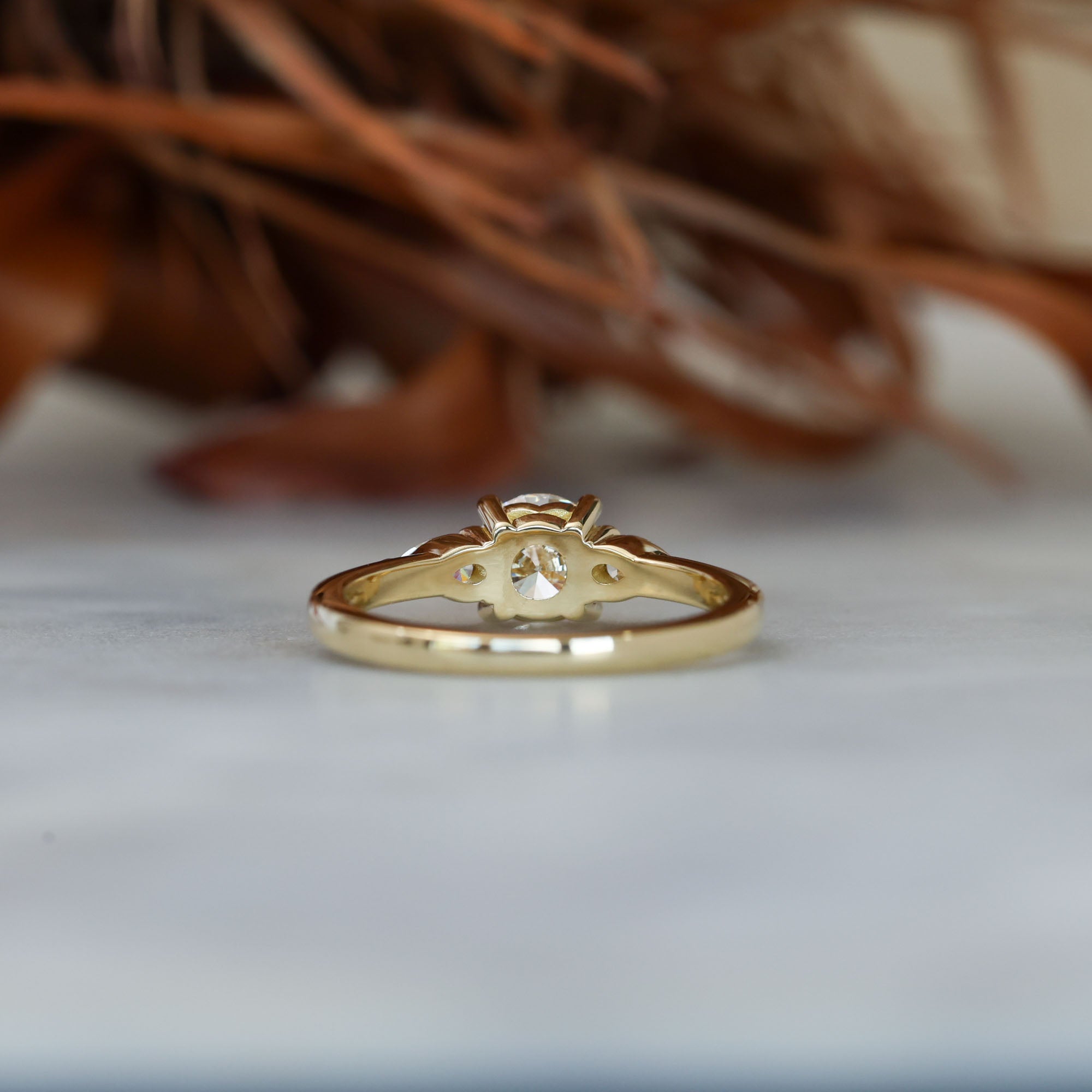 0.80ct round cut diamond may trilogy engagement ring