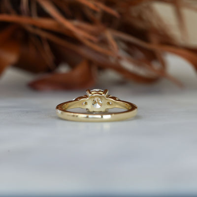 0.80ct round cut diamond may trilogy engagement ring