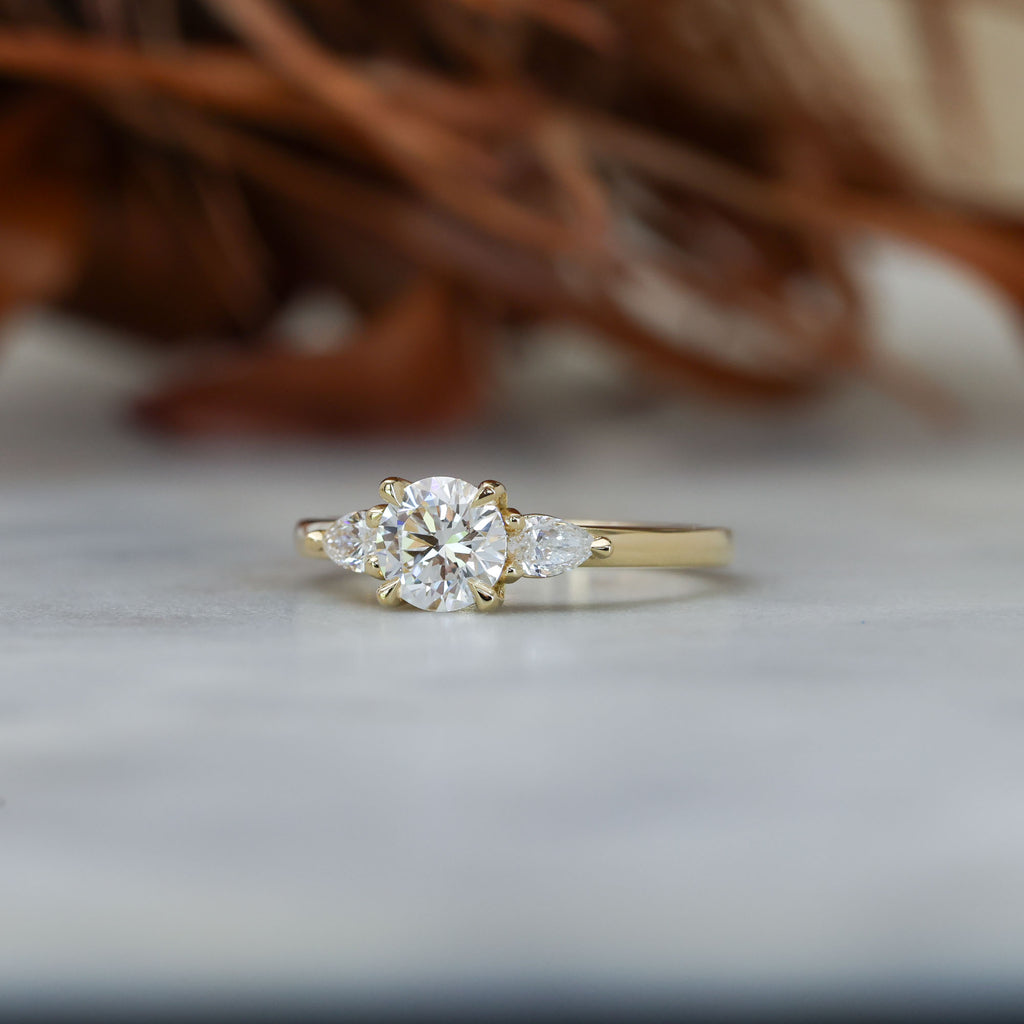 0.80ct round cut diamond may trilogy engagement ring 