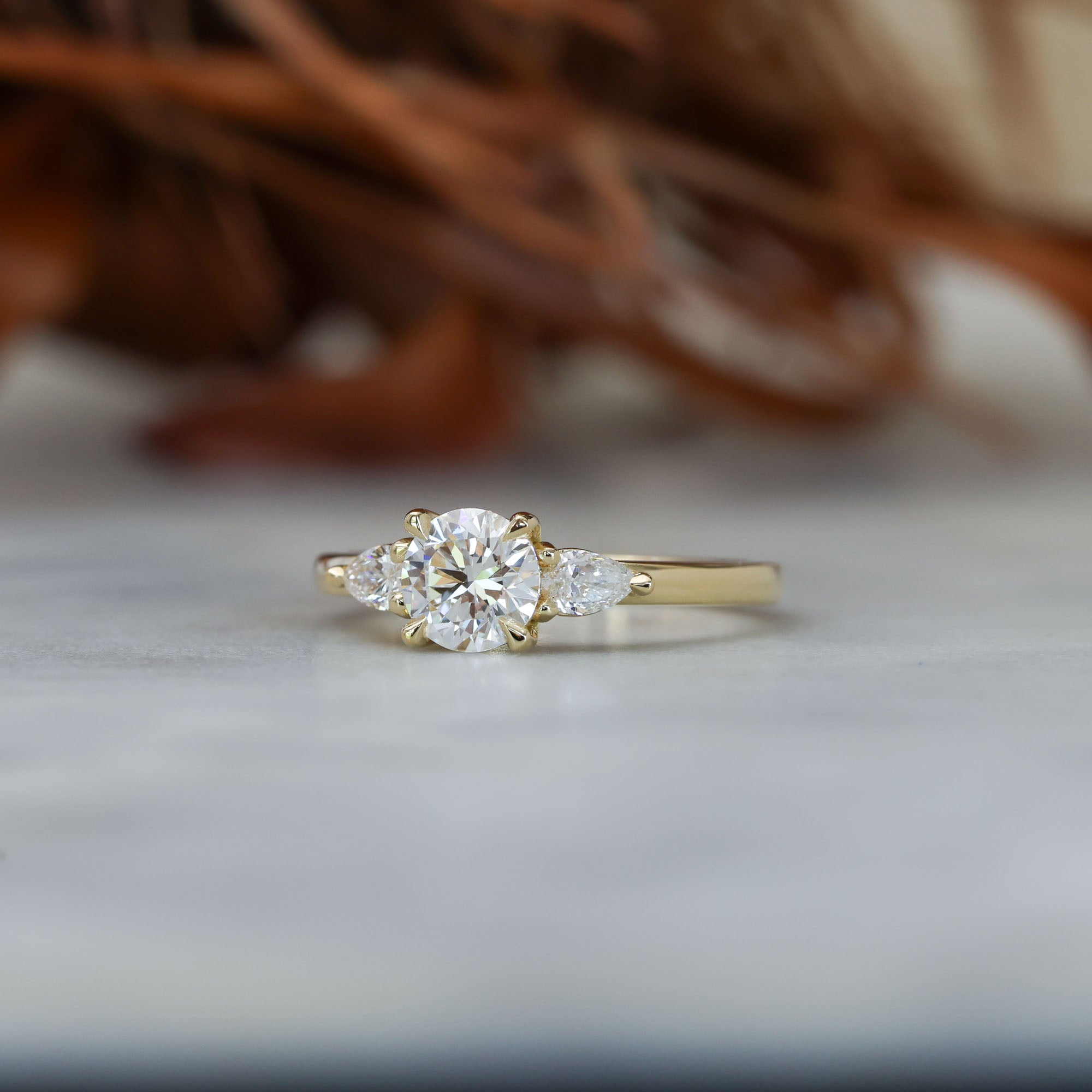 0.80ct round cut diamond may trilogy engagement ring