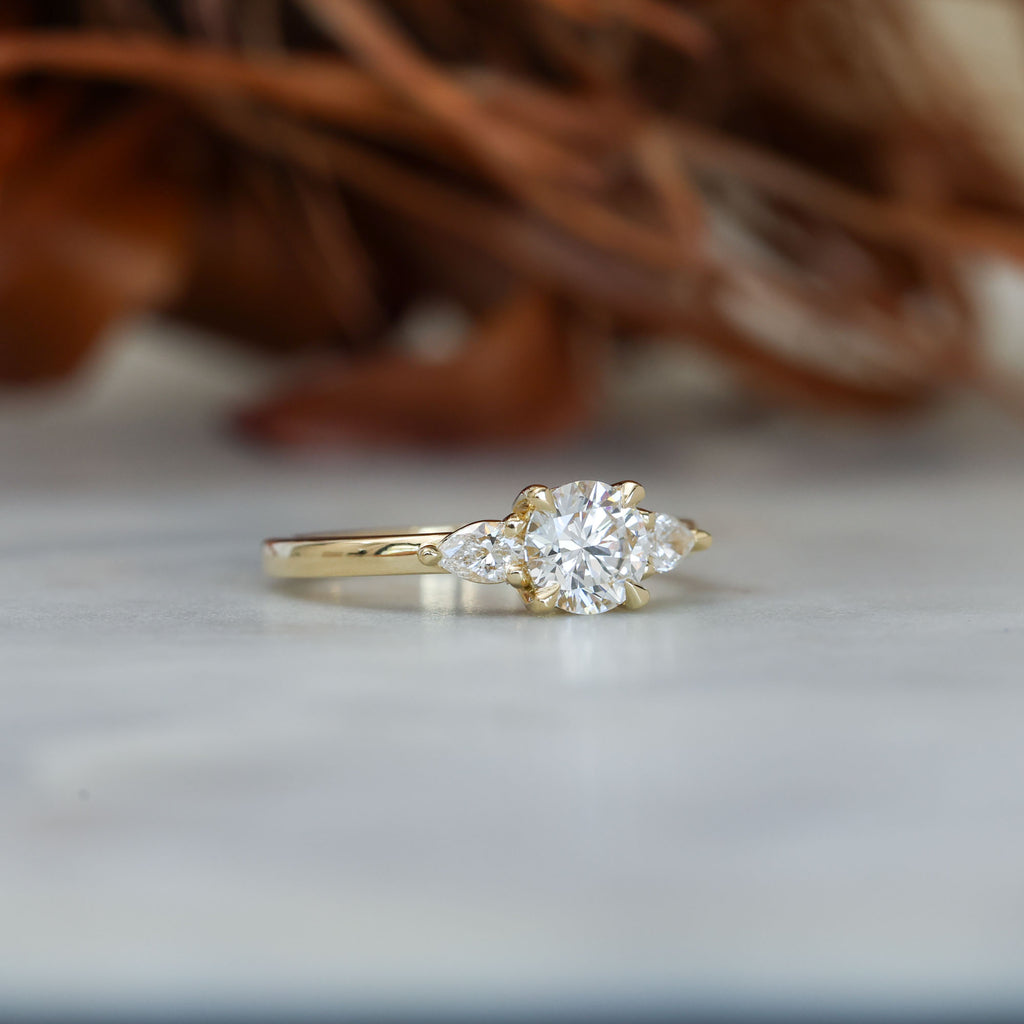 0.80ct round cut diamond may trilogy engagement ring 