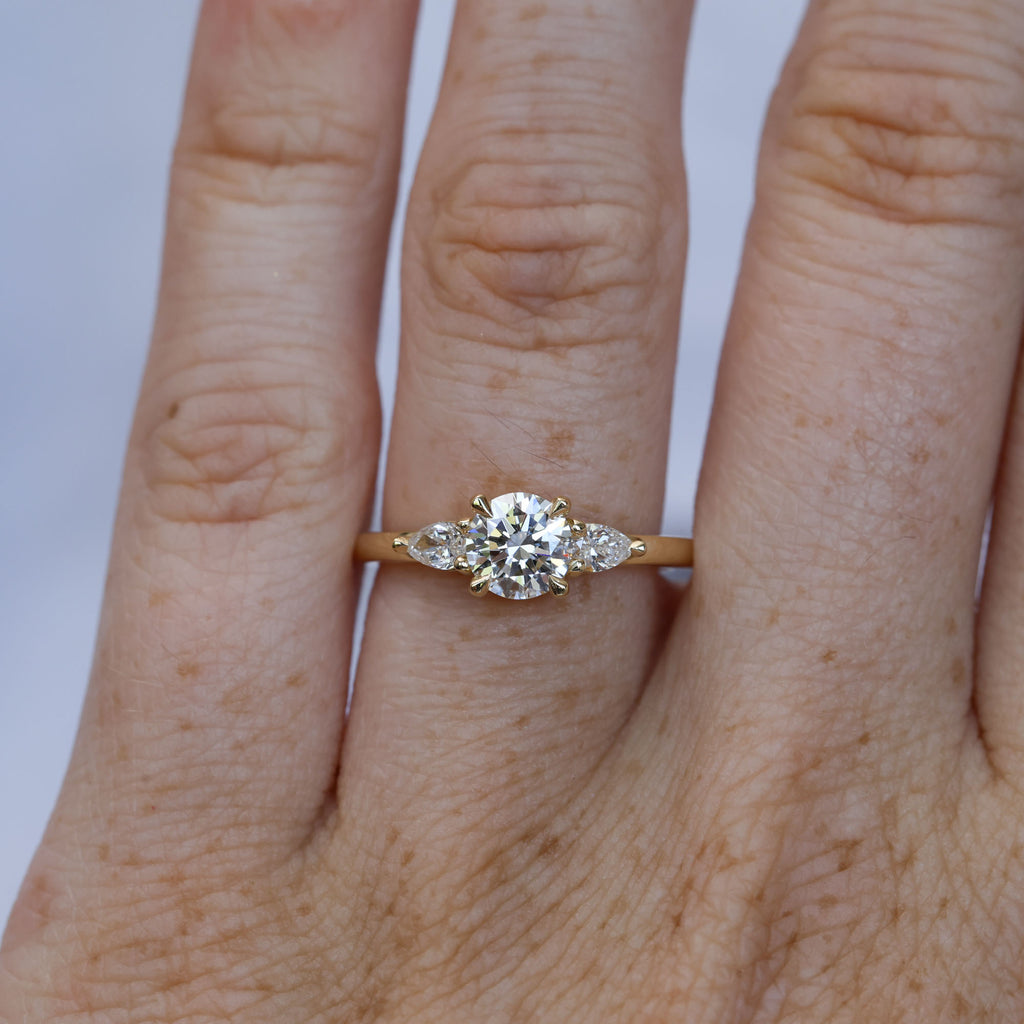 0.80ct round cut diamond may trilogy engagement ring 