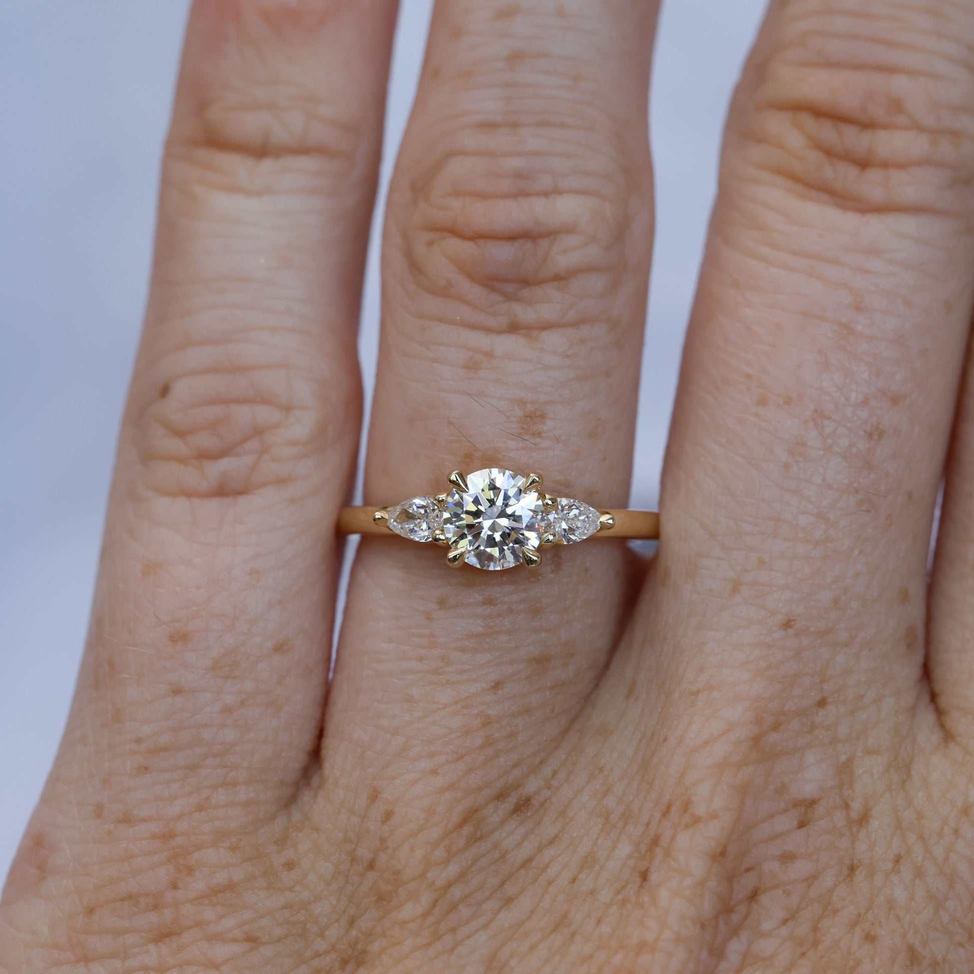 0.80ct round cut diamond may trilogy engagement ring 