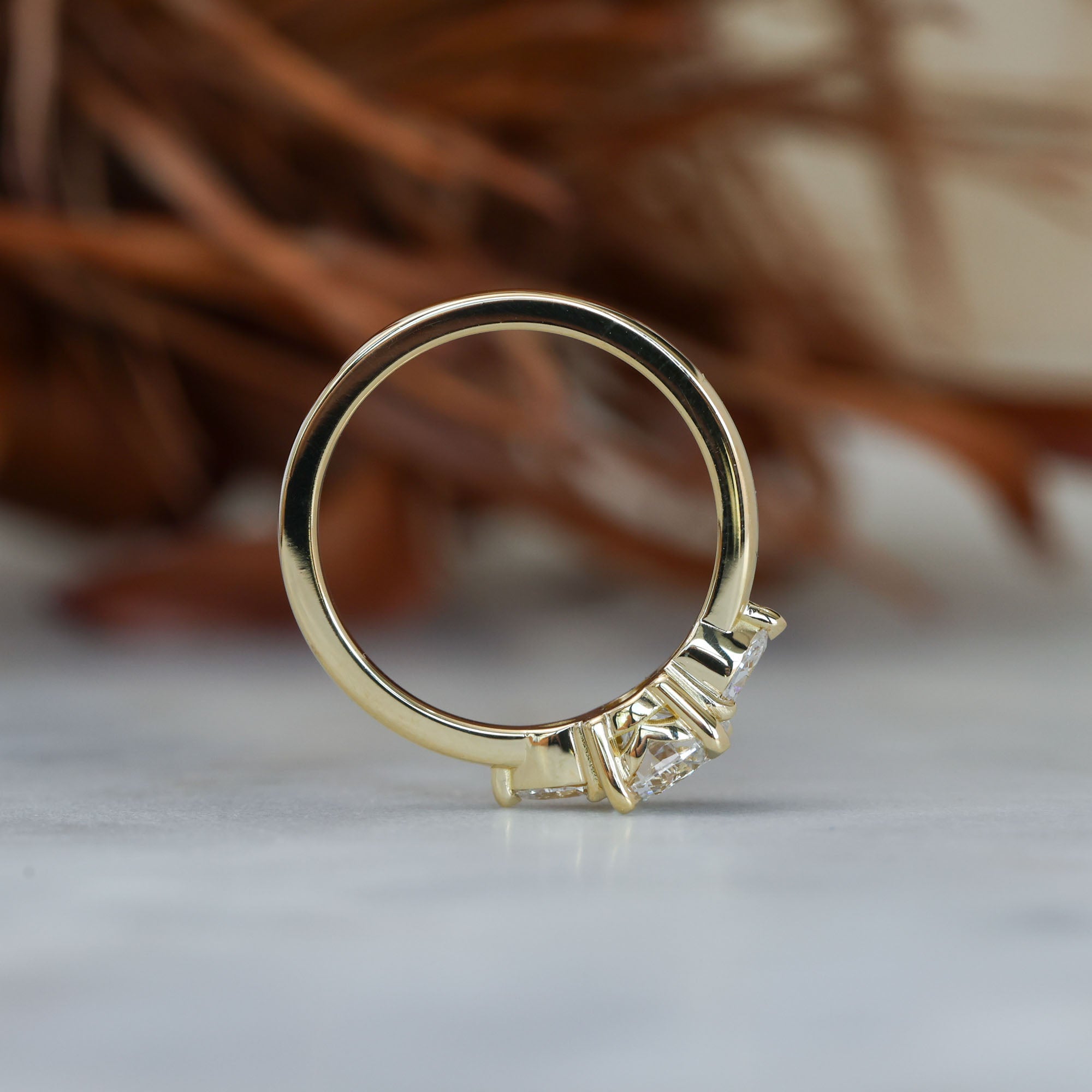 0.80ct round cut diamond may trilogy engagement ring