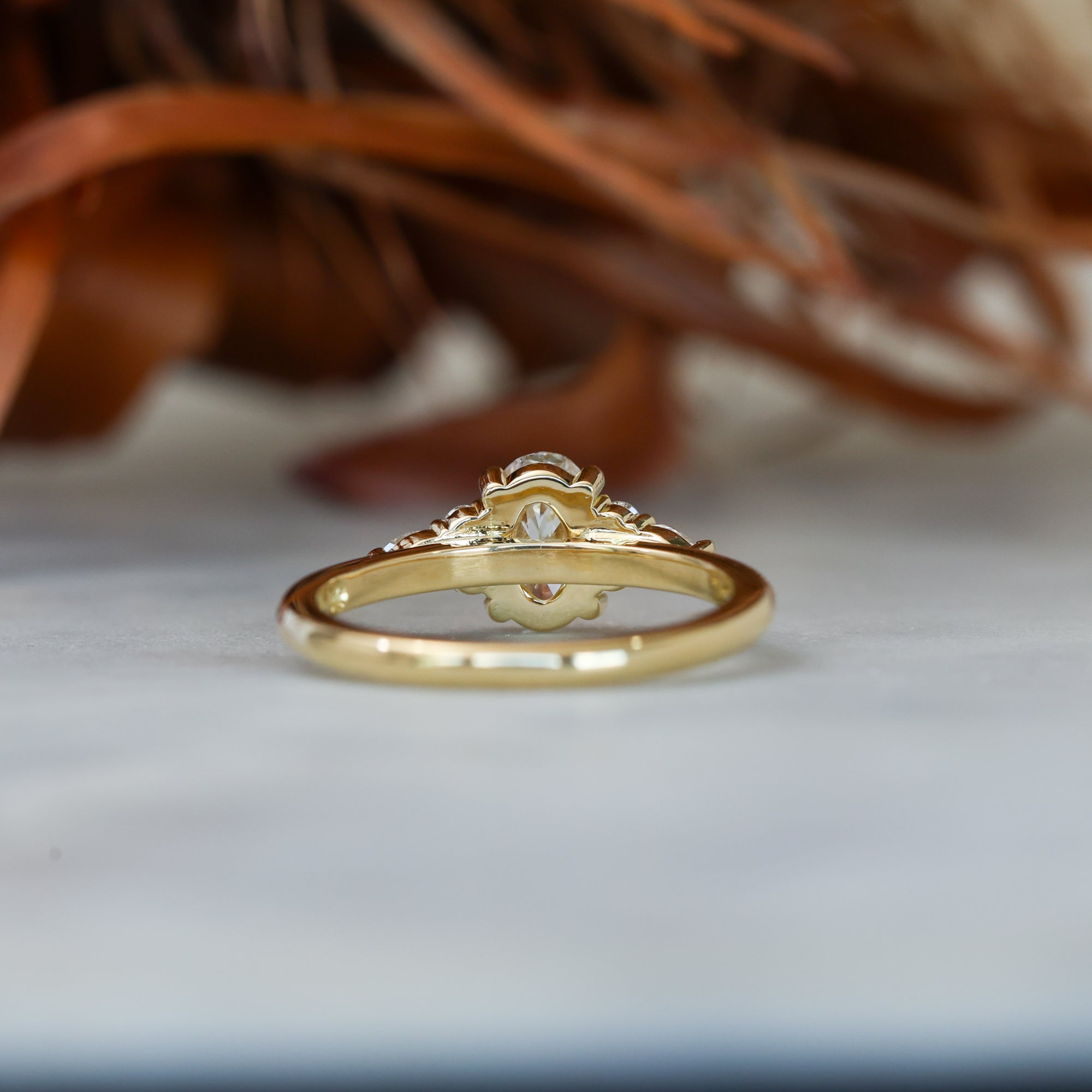 0.81ct oval cut diamond engagement ring with 6 side diamond back