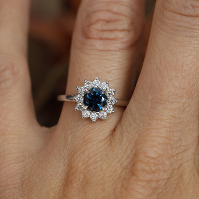 0.82ct Australian Parti Sapphire full diamond halo engagement ring on hand