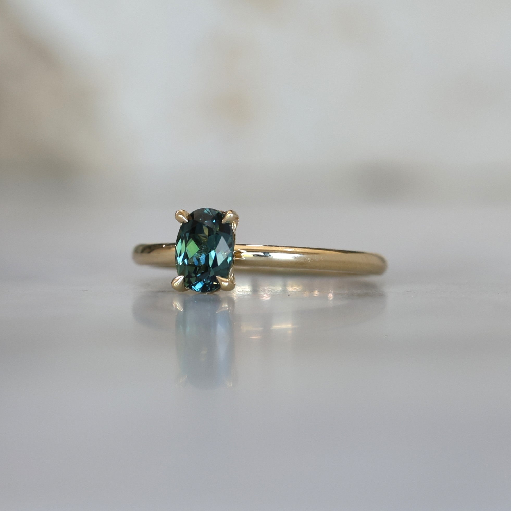 DUNE / 0.83CT OVAL AUSTRALIAN PARTI SAPPHIRE 4 CLAW SOLITAIRE