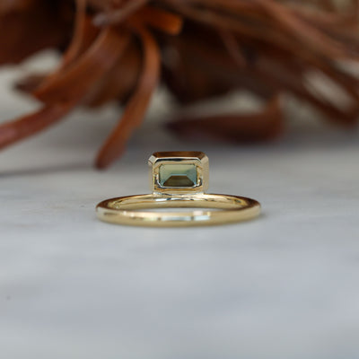 0.84ct emerald cut australian parti sapphire offset bezel engagement ring back