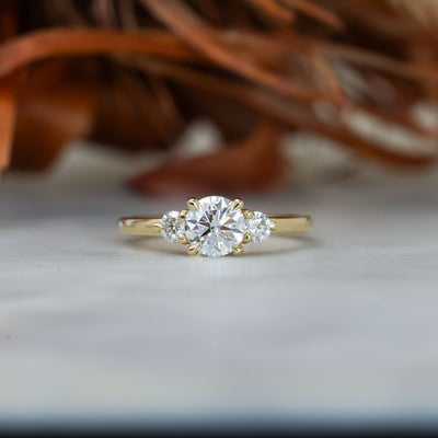 0.84ct round cut diamond trilogy engagement ring