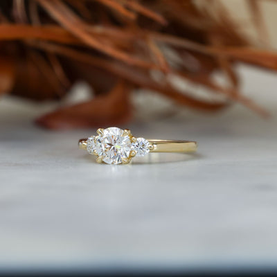 0.84ct round cut diamond trilogy engagement ring