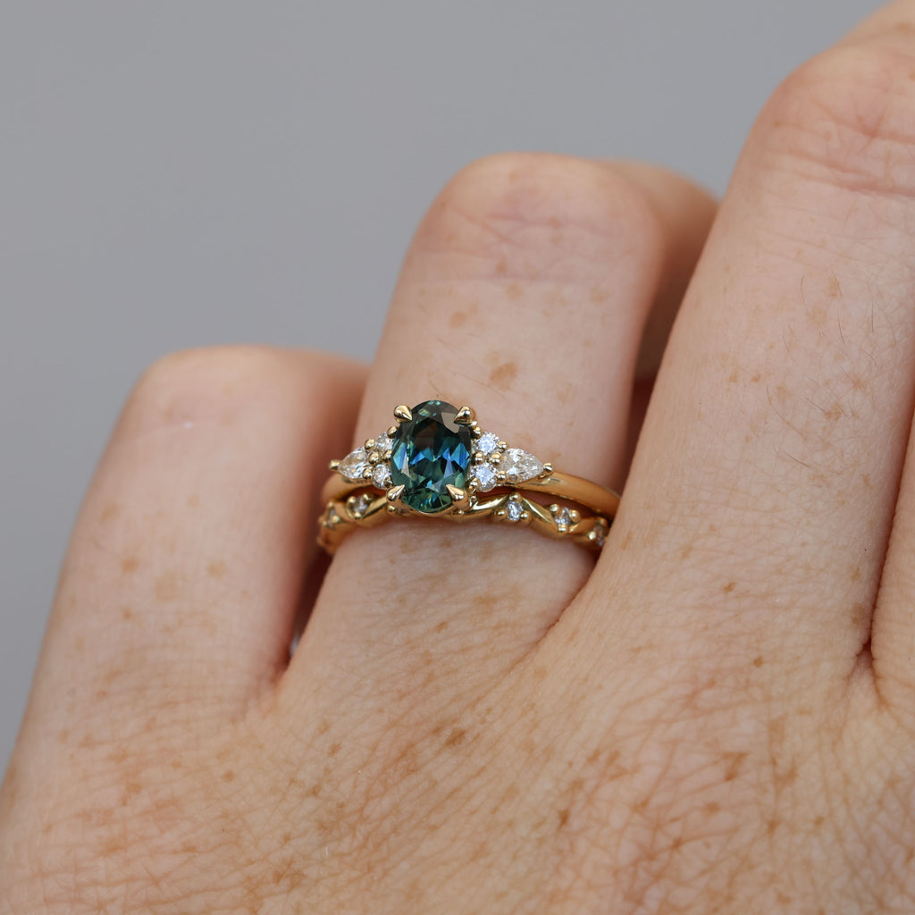 0.93ct oval cut australian sapphire engagement ring with wedding band