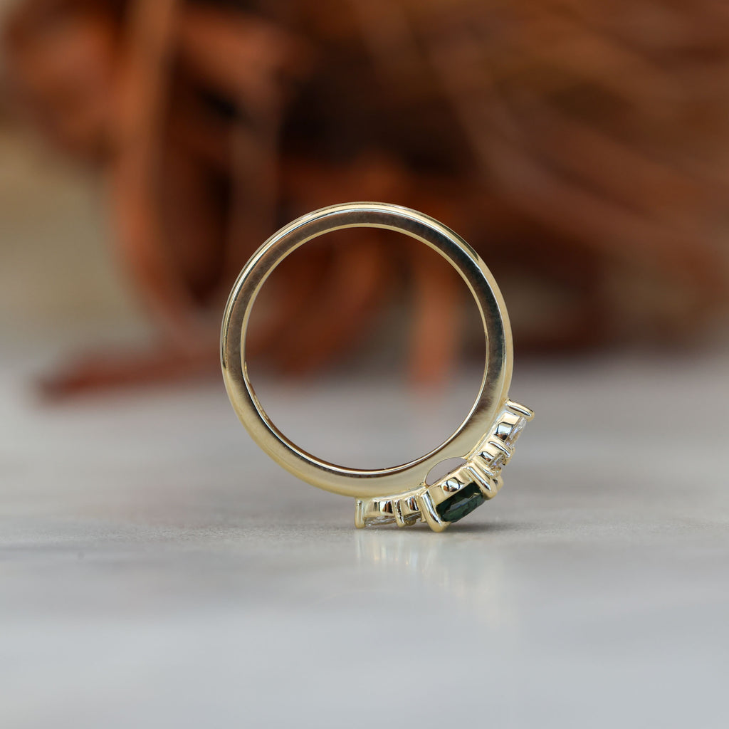 0.93ct oval cut Australian Sapphire and diamond engagement ring in yellow gold profile