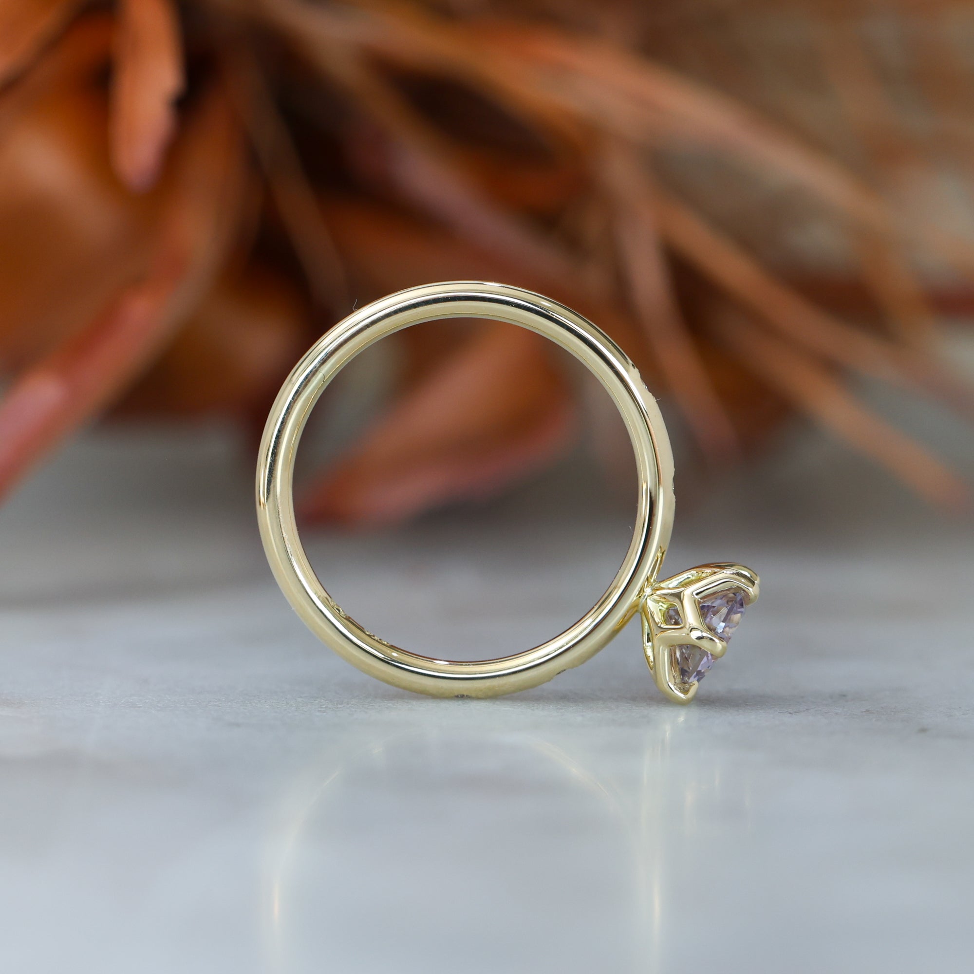 0.94ct Madagascan Sapphire engagement ring with stardust band profile view