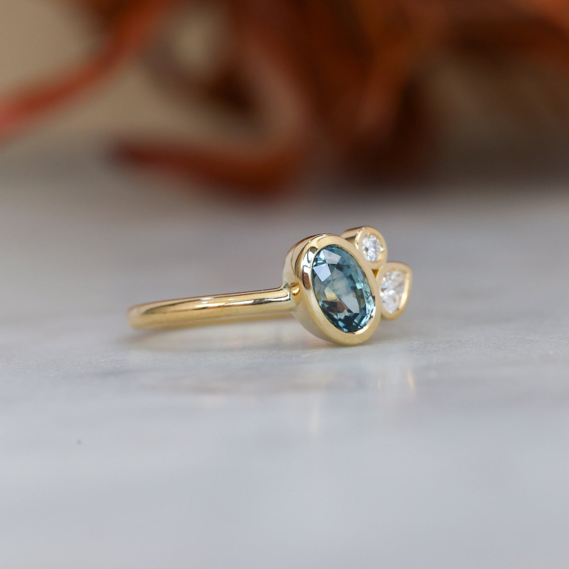 BRIDIE | 0.99CT OVAL MONTANA SAPPHIRE & DIAMOND ENGAGEMENT RING