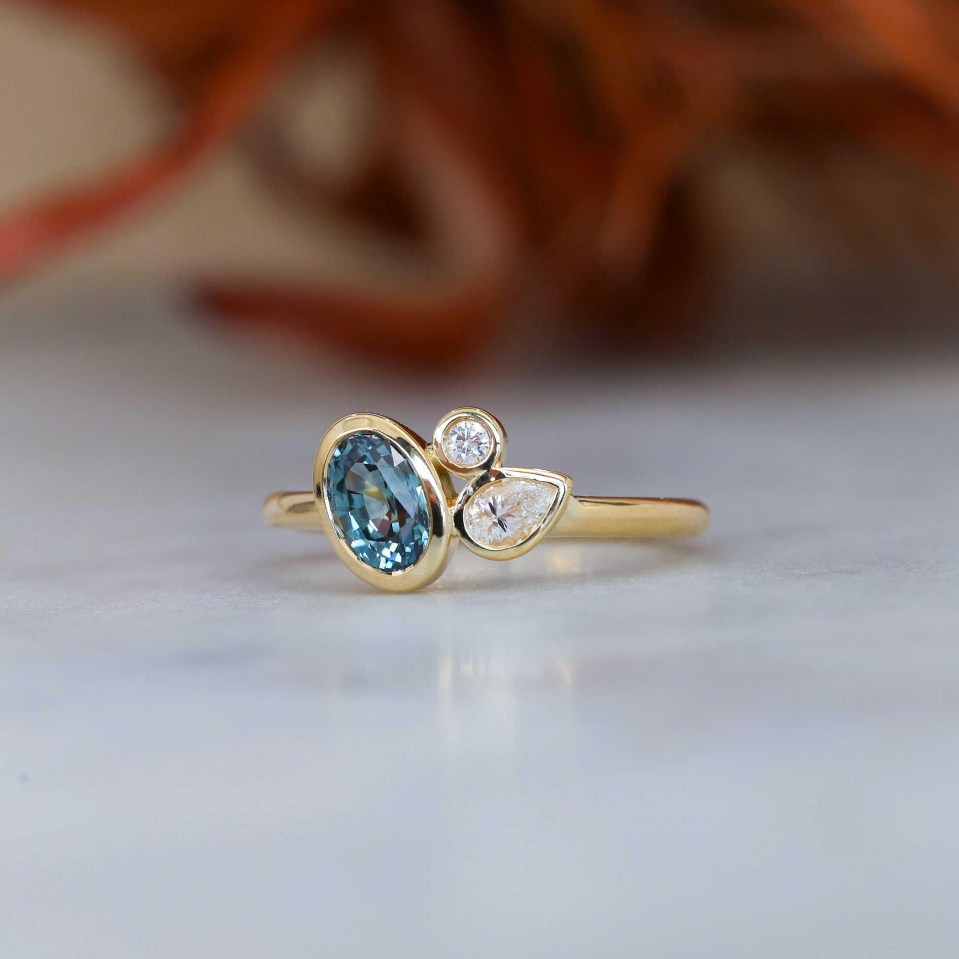 BRIDIE | 0.99CT OVAL MONTANA SAPPHIRE & DIAMOND ENGAGEMENT RING