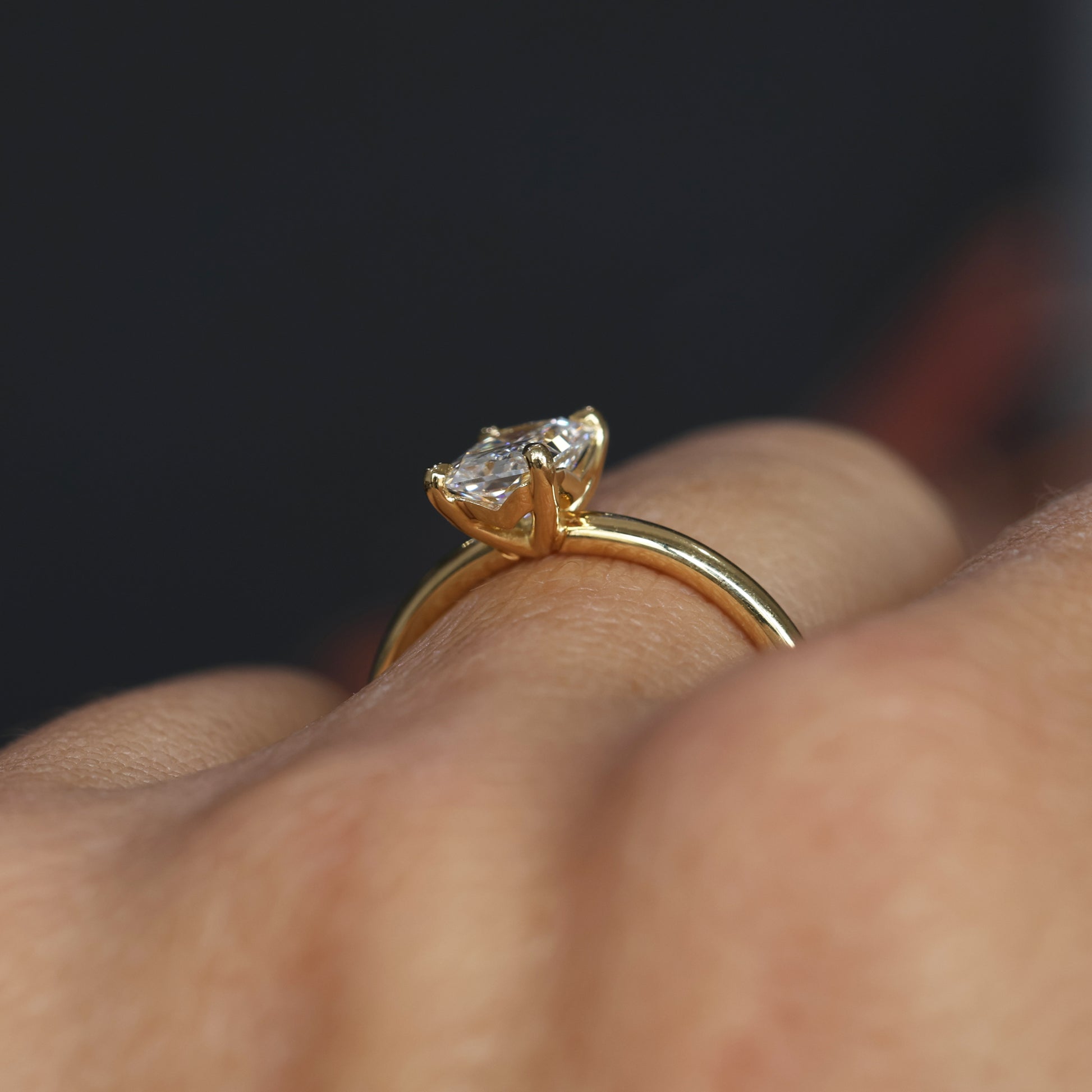 1.00ct Radiant Cut Diamond Solitaire engagement ring on hand profile view