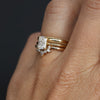 1.00ct Radiant Cut Diamond Solitaire engagement ring with wedding bands on hand