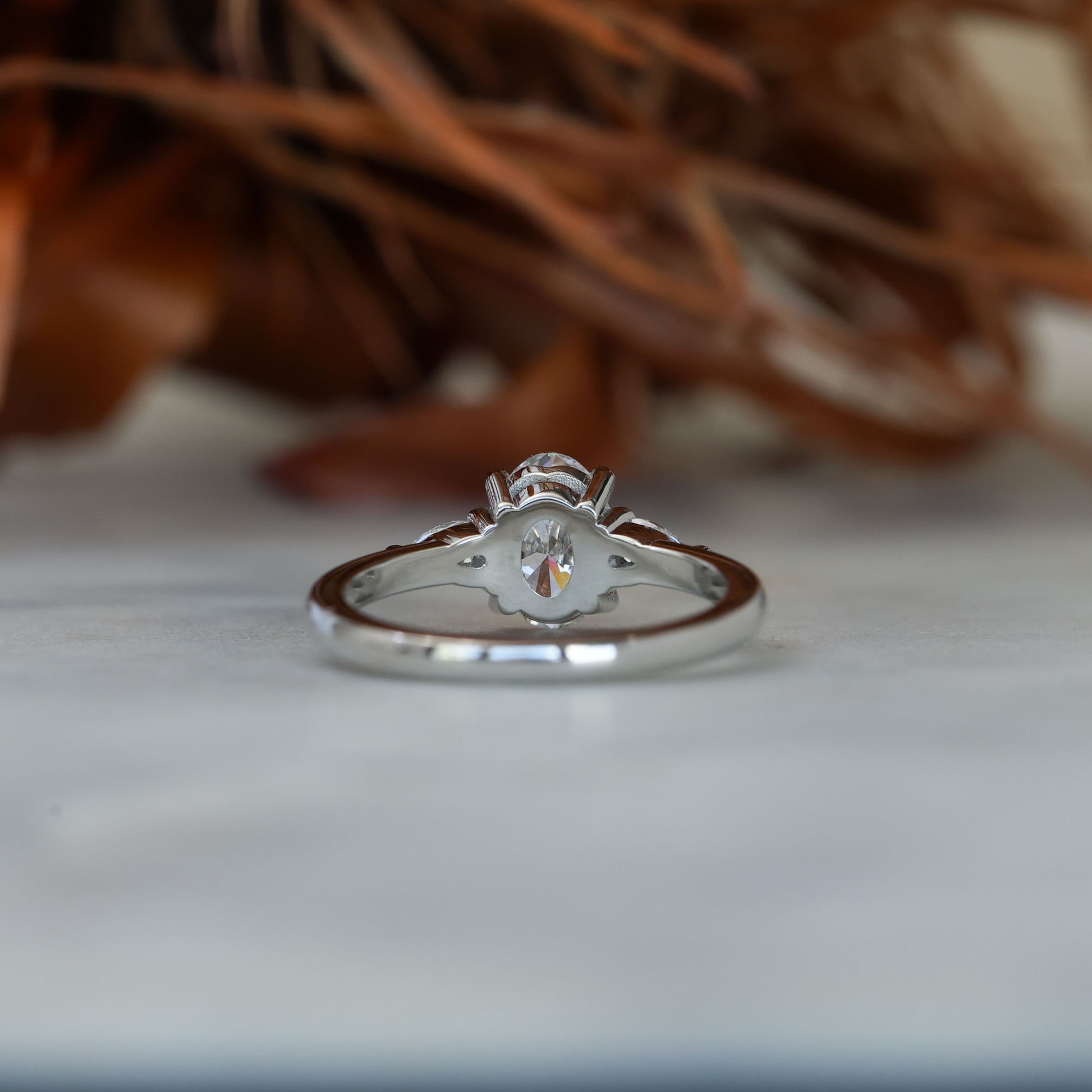 1.00ct oval cut diamond trilogy engagement ring platinum