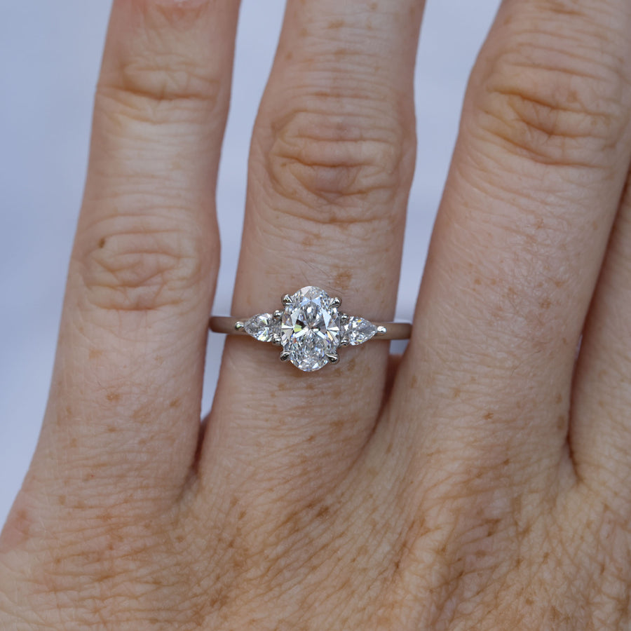 1.00ct oval cut diamond trilogy engagement ring platinum