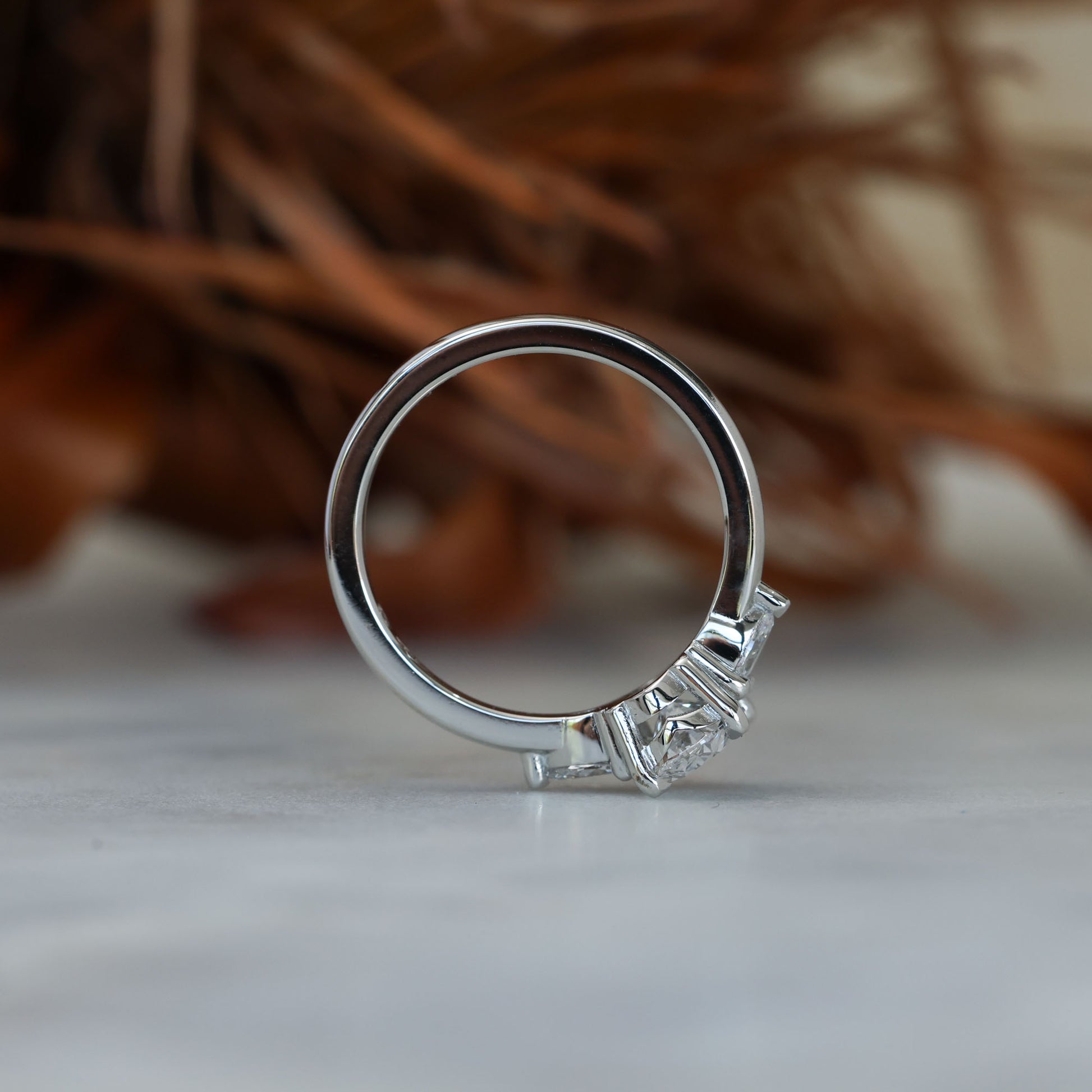 1.00ct oval cut diamond trilogy engagement ring platinum