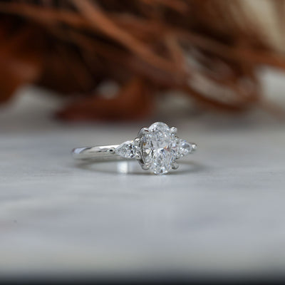 1.00ct oval cut diamond trilogy engagement ring platinum