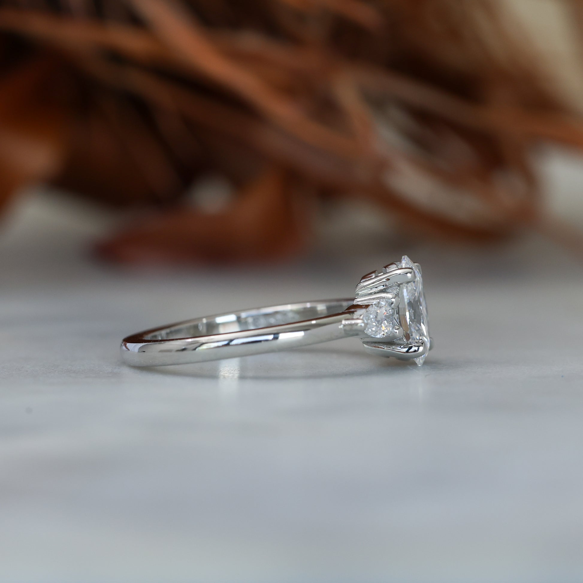 1.00ct oval cut diamond trilogy engagement ring platinum